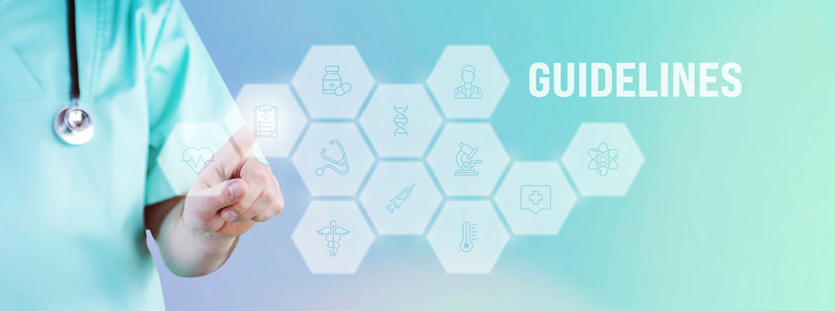 Medical Guidelines. Male doctor pointing finger at digital hologram made of icons. Text with medical term. Concept for digitalization in medicine.